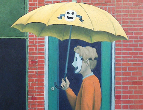 Man with happy face mask on carrying umbella with the same painted on the side