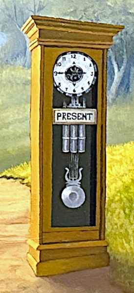 detail of the grandfather clock labeled Present