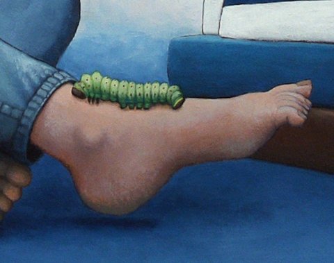 Catepillar crawling on a woman's bare foot