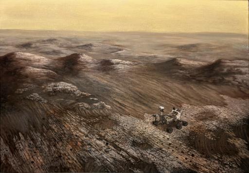A high angle view of the surface of Mars with rocks and windblown dust mounds. Among this scene is the robot explorer, Perseverance, the rover sent to Mars by NASA in 2020.